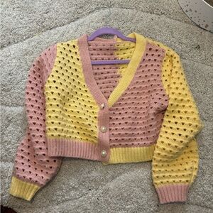 Pink and yellow cardigan with pearl buttons